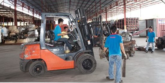 Forklift operator in the warehouse